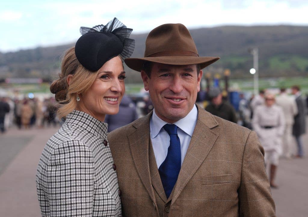 Peter Phillips smiling with his fiancee Harriet Sperling at Cheltenham