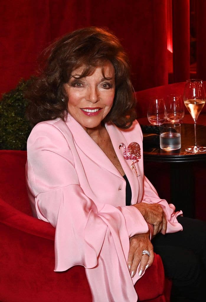 joan collins pink suit