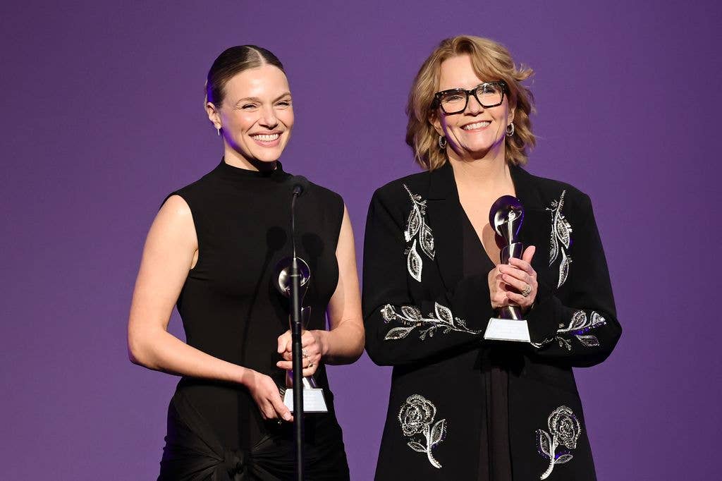 Tracy Spiridakos and Lea Thompson speak onstage at the Alliance for Women in Media Foundation's 51st Annual Gracie Awards at the Beverly Wilshire, a Four Seasons Hotel on May 19, 2026 in Beverly Hills, California.