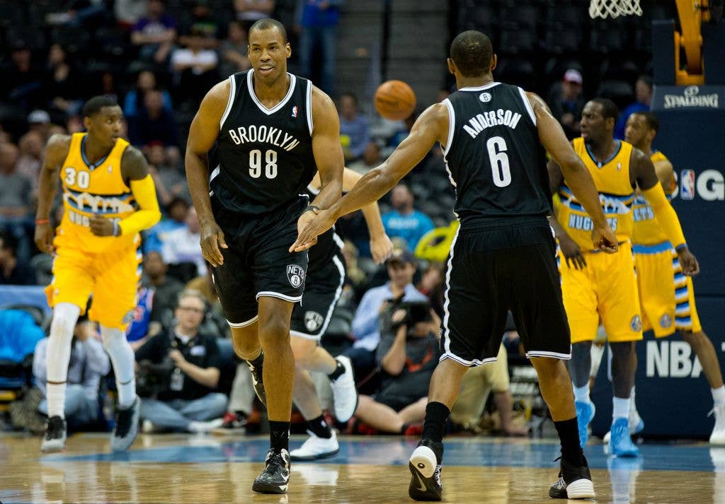 photo of jason collins in brooklyn nets jersey on court