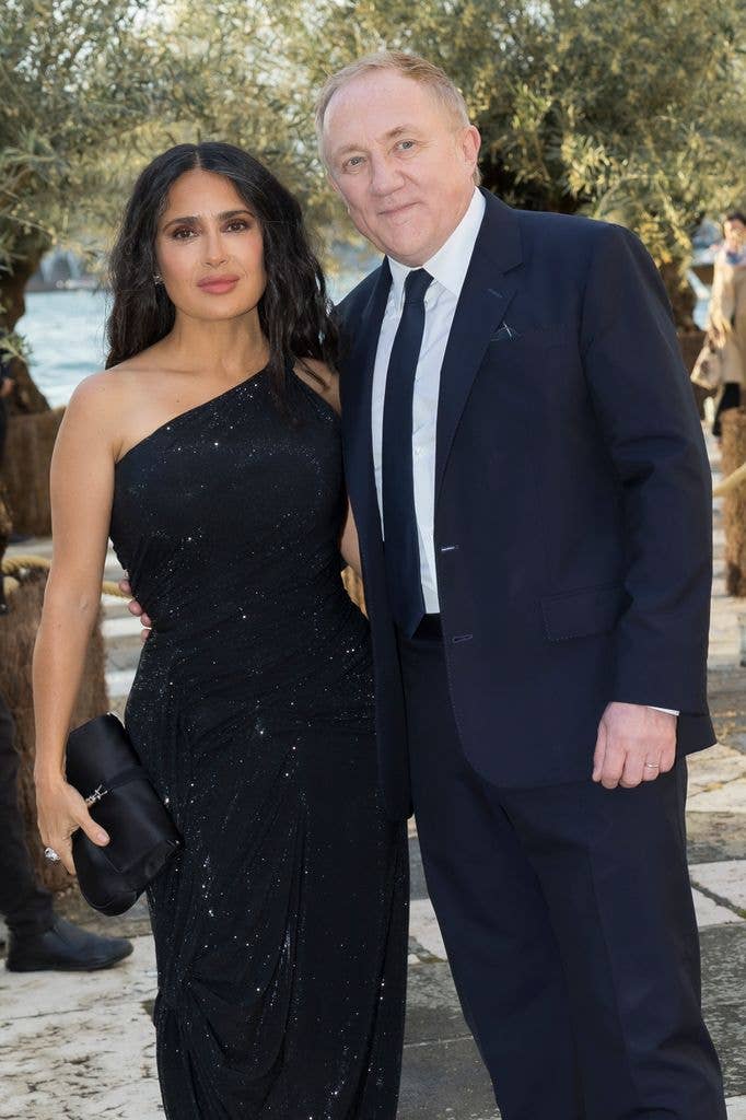 Salma Hayek in black dress and her husband François-Henri Pinault in suit