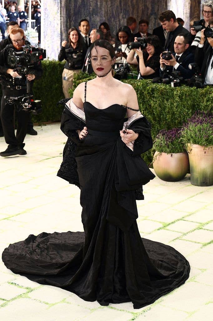 Claire Foy wore a black dress with dramatic veiled headpiece
