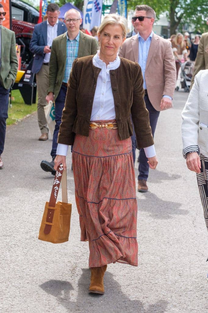 Sophie teamed her Lexy London skirt with a pair of cowboy boots, designed by Penelope Chilvers