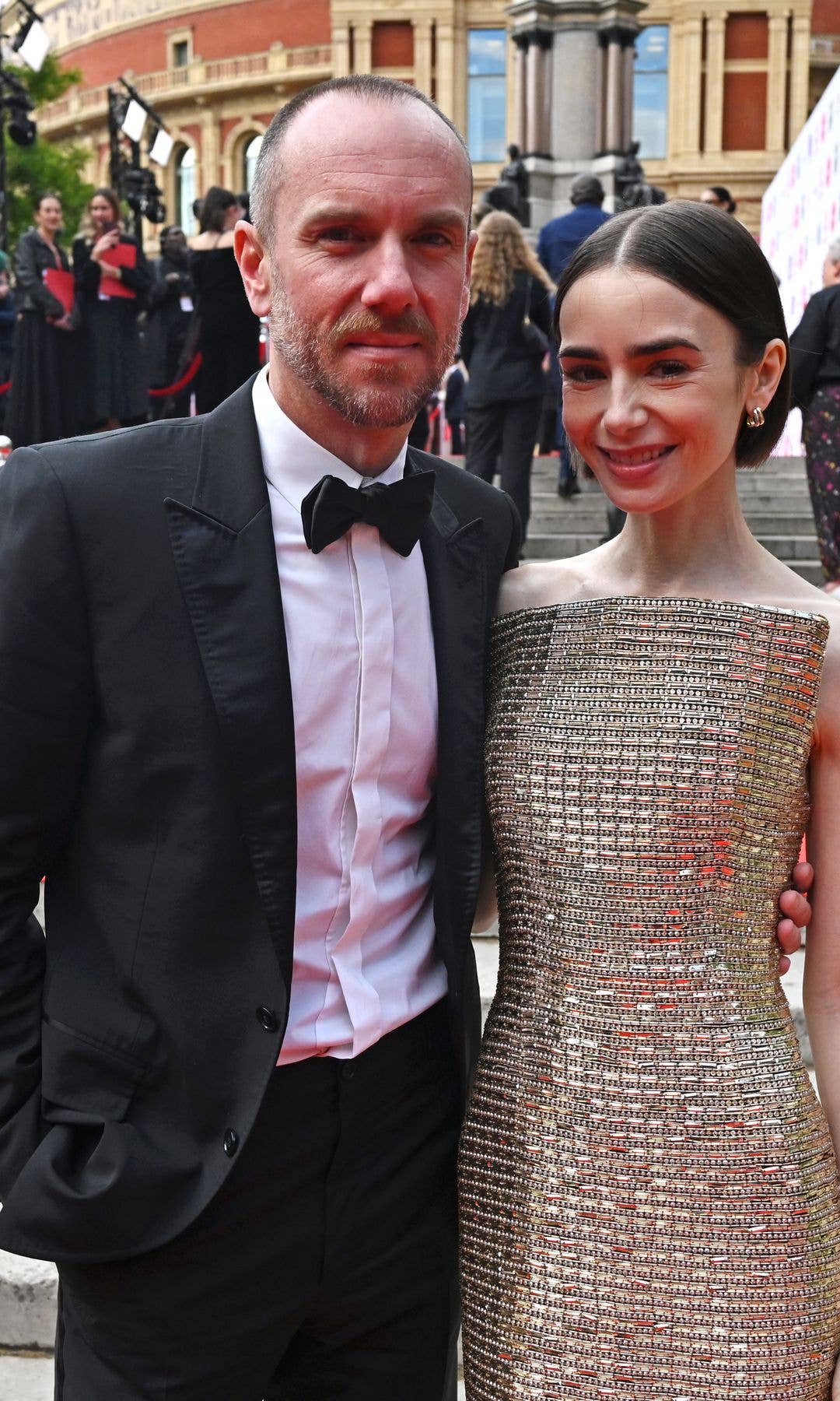 Charlie McDowell and Lily Collins at A King's Trust event