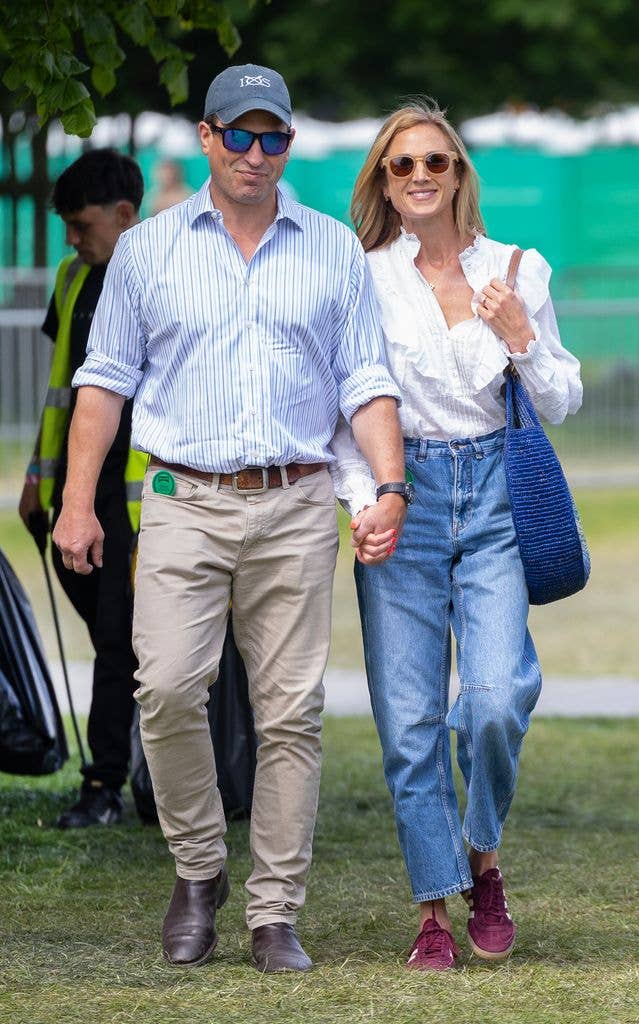 harriet sperling in jeans and peter phillips holding hands