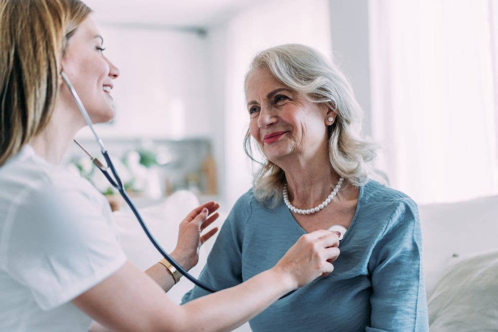 woman lung exam by doctor