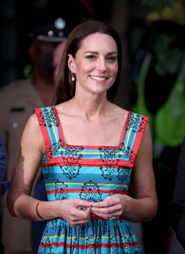 Kate in printed sundress outside