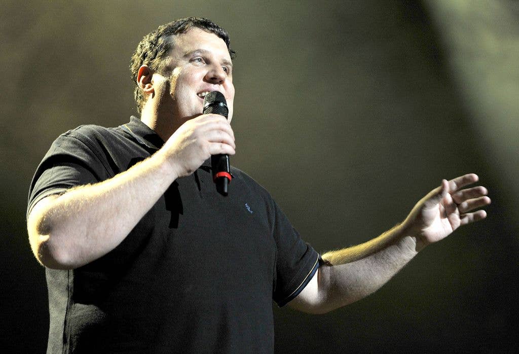 Peter performing onstage in Manchester