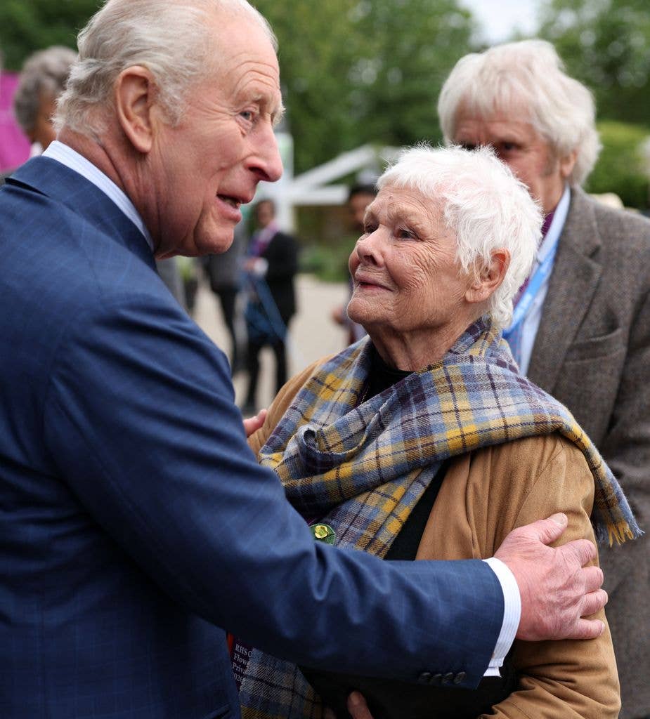 Britain's King Charles III talks with actor Judi Dench at the 2026 RHS Chelsea Flower Show in London on May 18, 2026