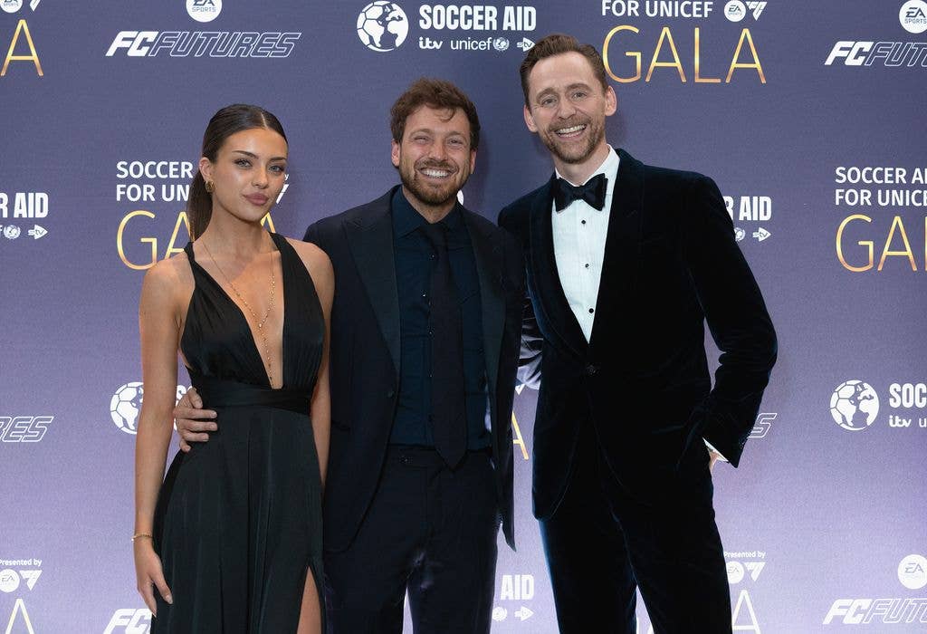Sam Thompson posed for pictures with his girlfriend, Talitha Balinska and Tom Hiddleston