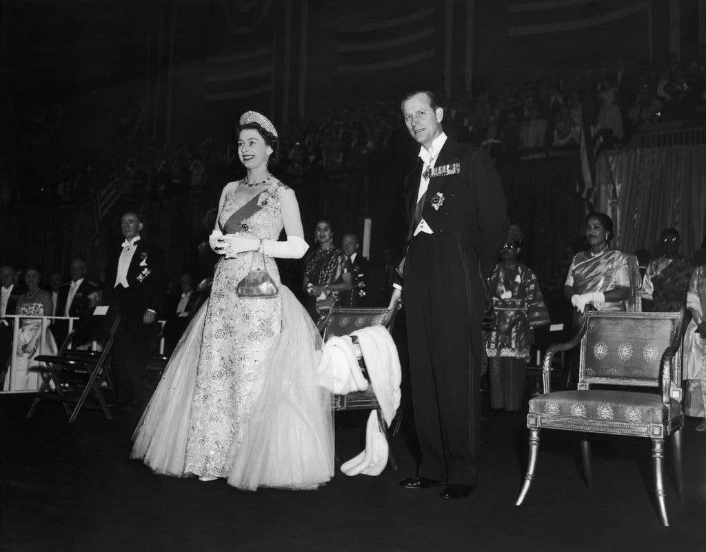 Queen Elizabeth visited New York on more than one occasion during her reign. The late monarch and Prince Philip are pictured here at the Commonwealth Ball in October 1957. 
