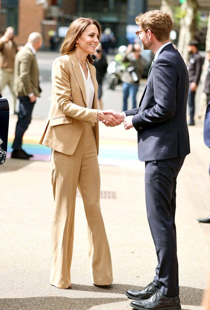 The Princess of Wales shakes hands as she arrives for the launch of "Foundations for Life: A Guide to Social and Emotional Development" at the University of East London 