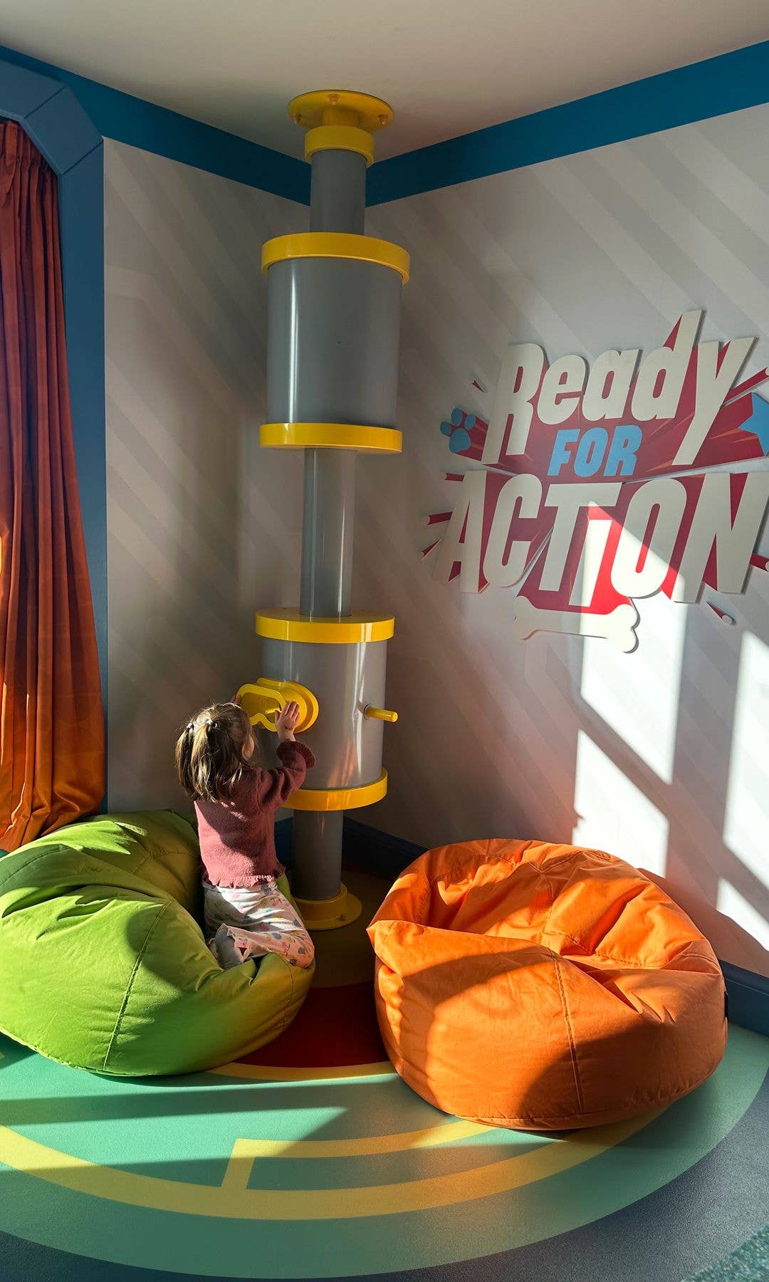 The room even has a control panel and comfy beanbags in the corner