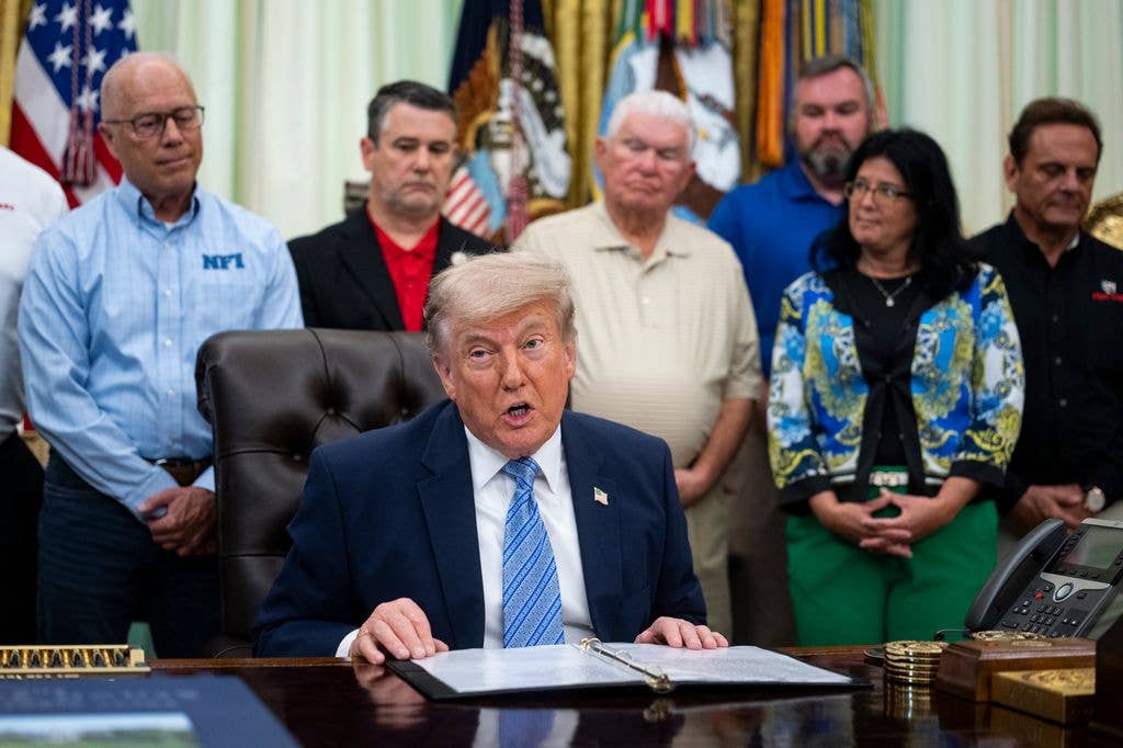 President Donald Trump speaks at an event with Environmental Protection Agency (EPA) Administrator Lee Zeldin on May 21, 2026 in the Oval Office at the White House in Washington, D.C. Trump said he would rescind Biden-era regulations on refrigerators and air conditioners.