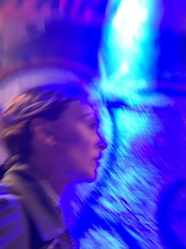 blurry photo of natalie portman in paris at night
