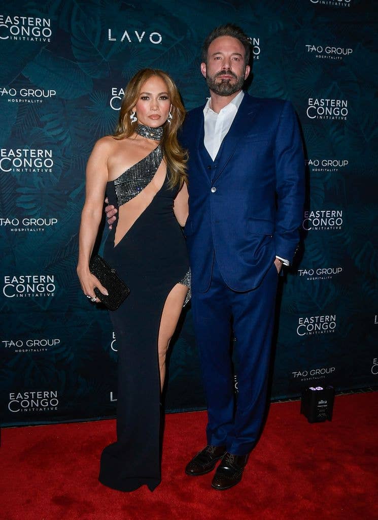 photo of jennifer lopez and ben affleck with arms around each other on red carpet