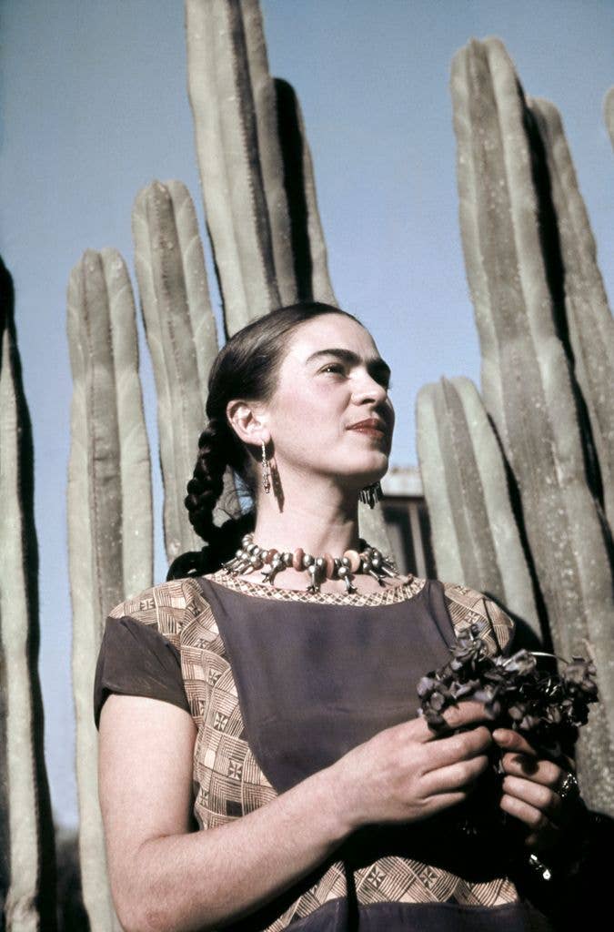 Artist Frida Kahlo poses for a portrait at her studio in Mexico City (c.1940)