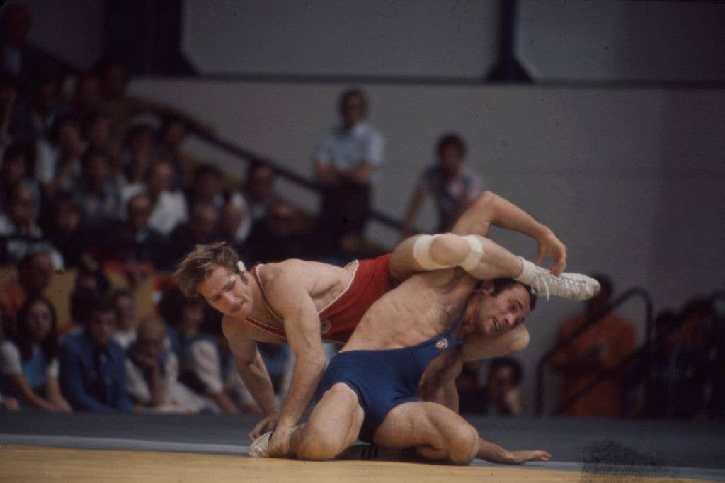 Dan Gable and Ruslan Ashuraliyev competing in the Men's freestyle 68 kg wrestling event at the 1972 Summer Olympics