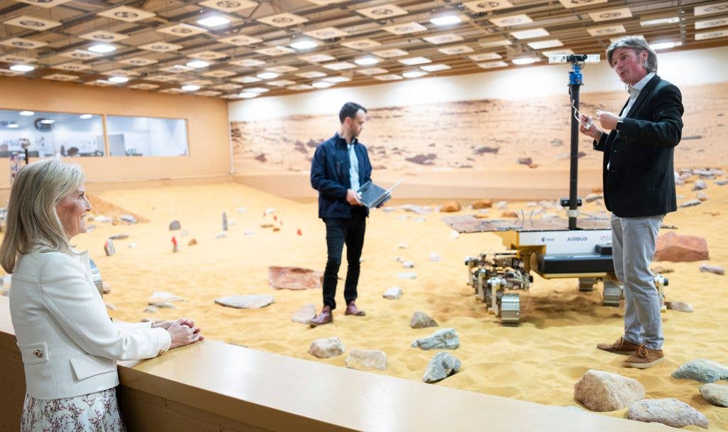 Sophie, Duchess of Edinburgh looking at the Mars Yard Test Area covered in sand