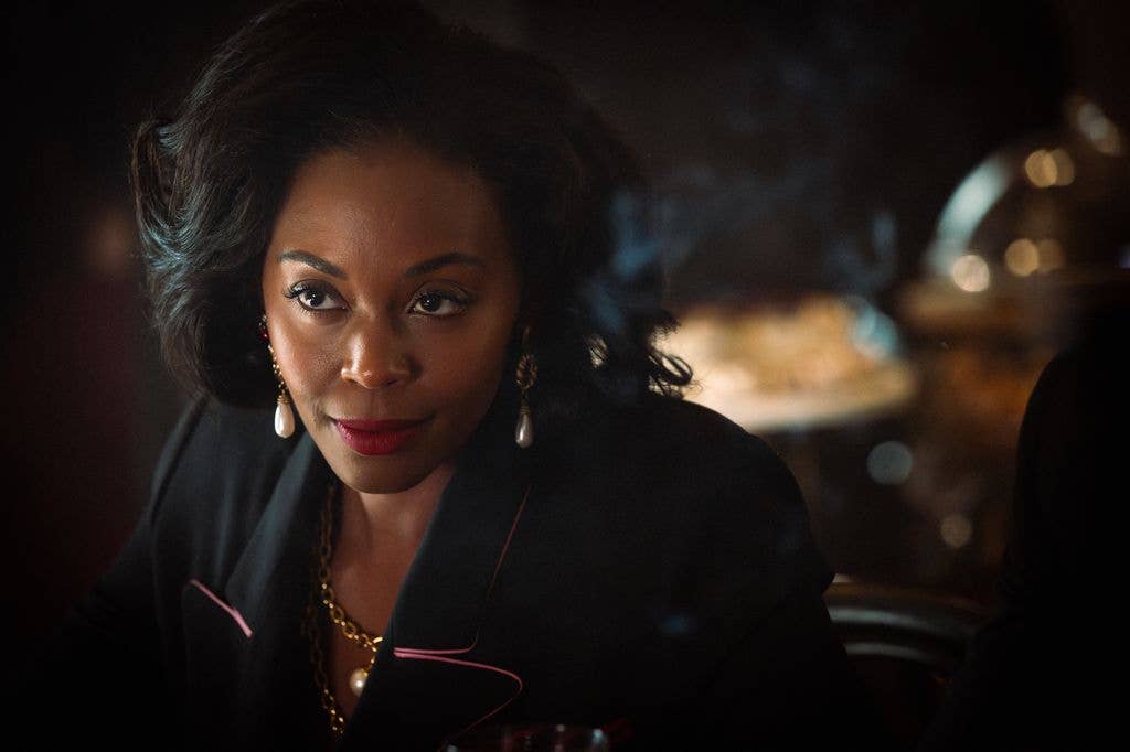 close-up of woman in black suit