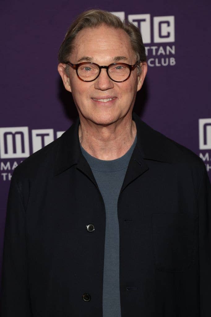 Richard Thomas in a dark tshirt and dark shirt.
