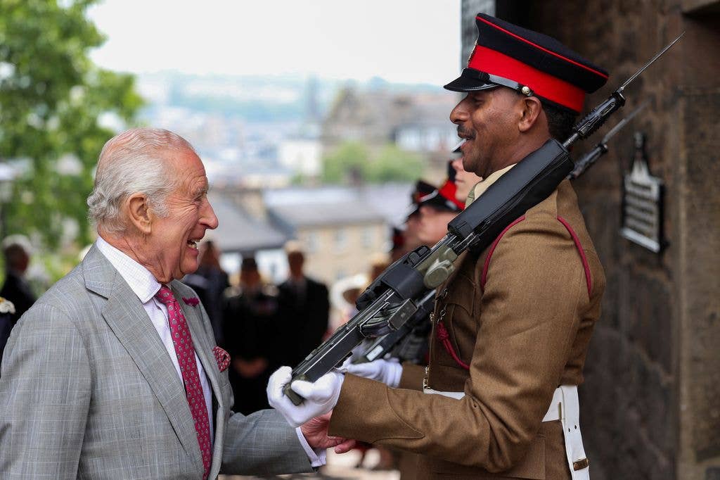 The monarch was caught laughing as he inspected the honor guard during the Ceremony of the Keys at Lancaster Castle in 2025.