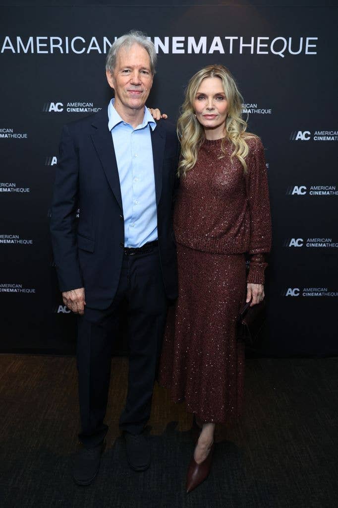 photo of michelle pfeiffer and david e kelley on red carpet