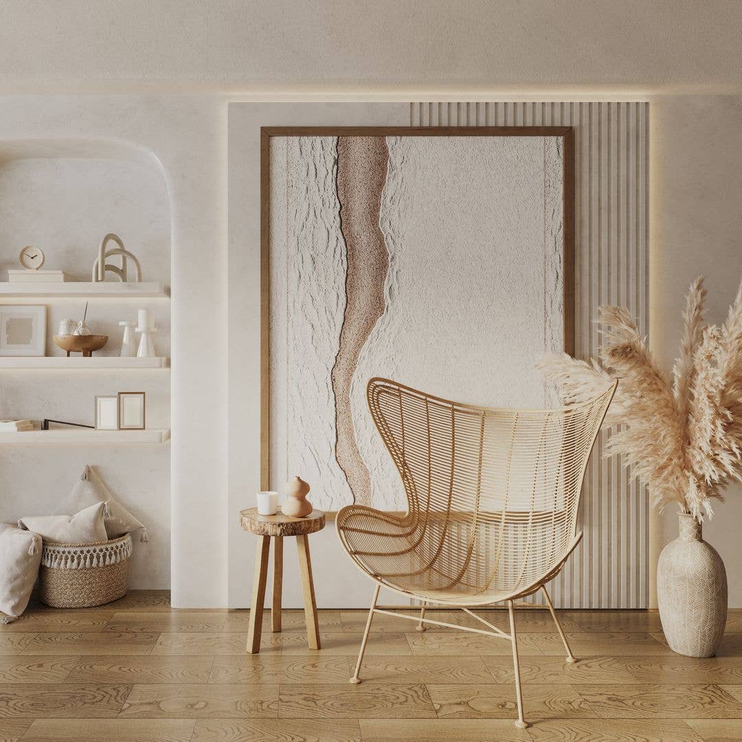 Boho living room interior with decorative wall, dried flowers in vase, rattan armchair, book and elegant accessories in stylish home decor.