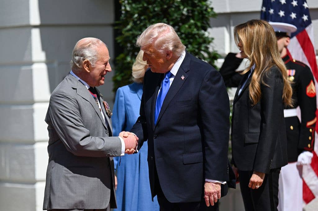 King Charles and U.S. President Donald Trump shake hands during a farewell ceremony at the White House
