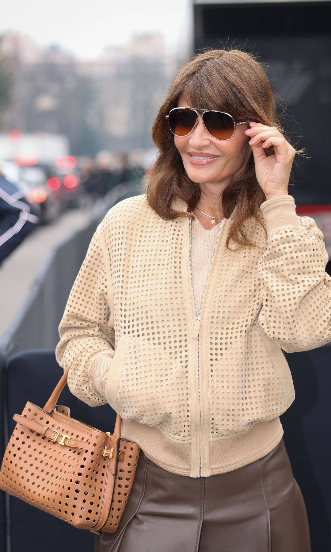 Helena Christensen arrives at the Tod's fashion show during the Milan Womenswear Fall/Winter 2026/2027 