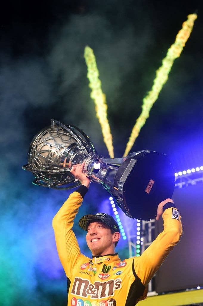 Kyle Busch, driver of the #18 M&M's Toyota, celebrates in Victory Lane after winning the Monster Energy NASCAR Cup Series Ford EcoBoost 400 and the Monster Energy NASCAR Cup Series Championship at Homestead Speedway on November 17, 2019 in Homestead, Florida. (Photo by Jared C. Tilton/Getty Images)