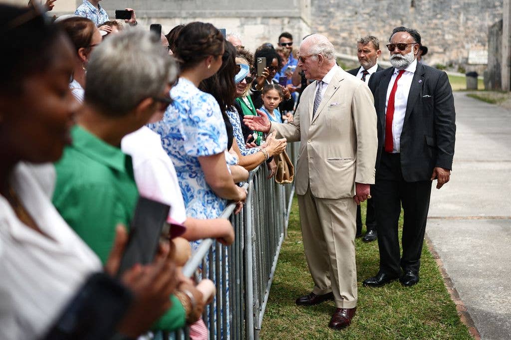 King Charles greeting crowd of people
