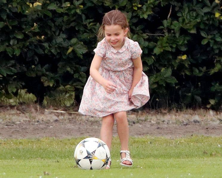 No sneakers? No problem. Princess Charlotte played soccer in a pink floral dress and sandals at the King Power Royal Charity Polo Match in 2019