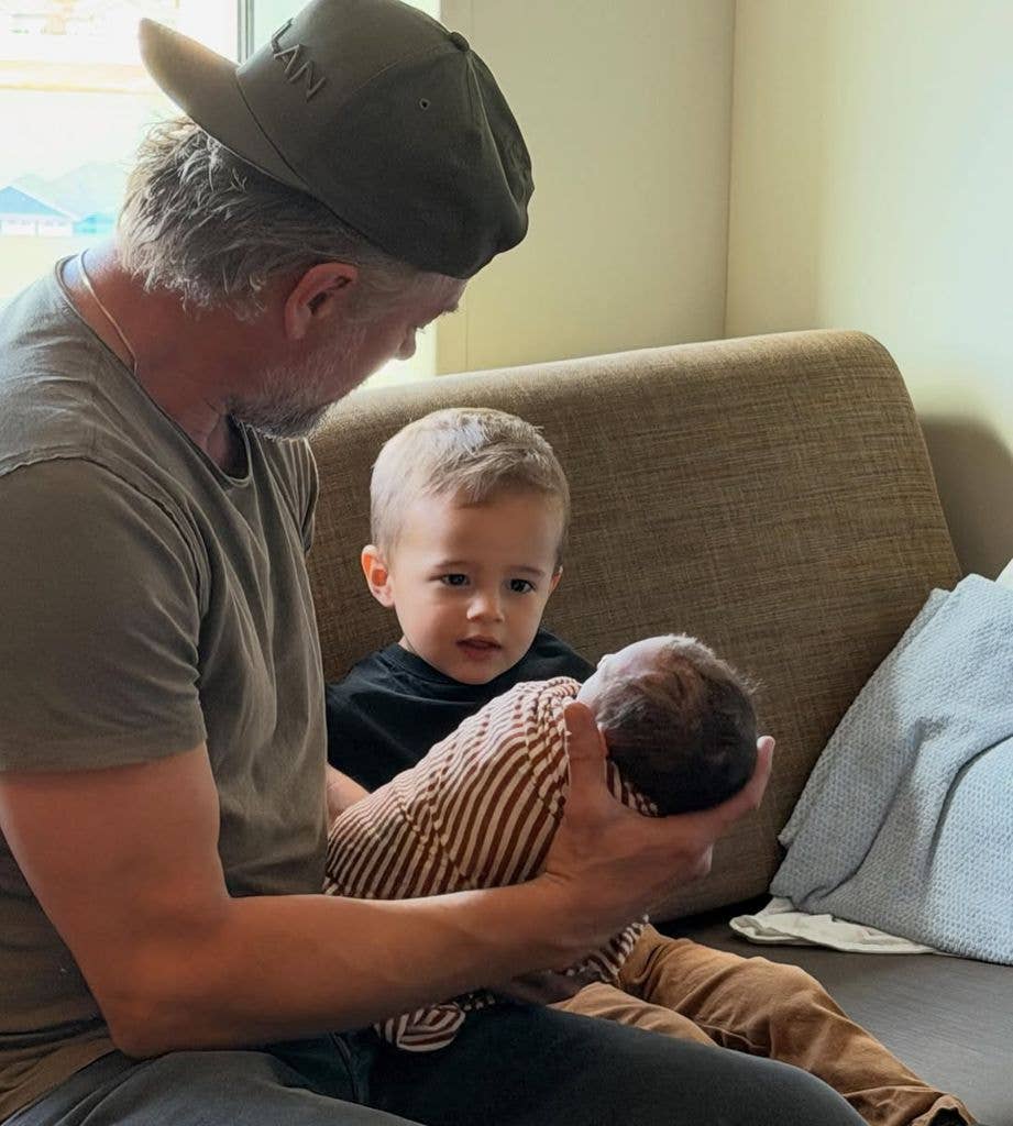 Josh introducing his daughter to her big brother