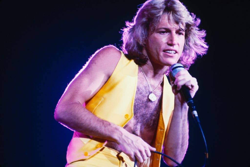 British-born Australian singer and songwriter Andy Gibb (1958 - 1988) performing on stage, USA, 1978.