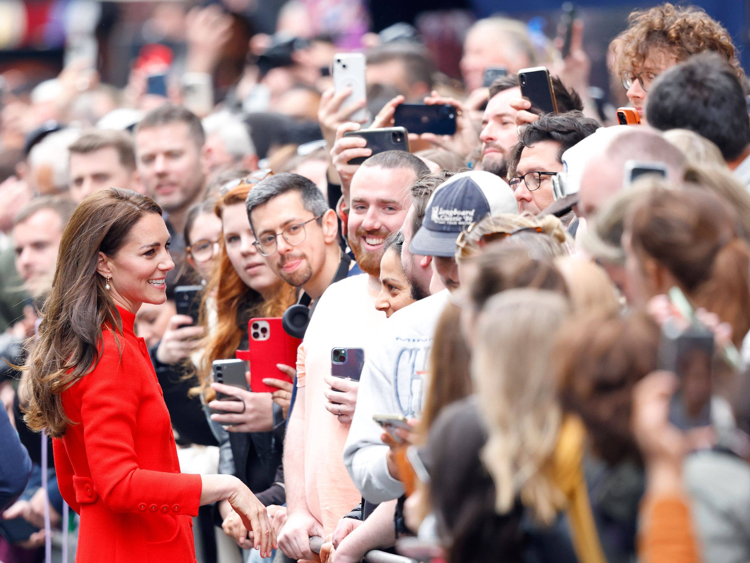 Kate the crowd pleaser: on a walkabout in Soho, London, in 2023