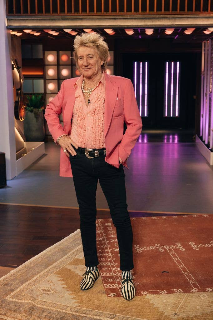 Rod Stewart in a peach-coloured suit