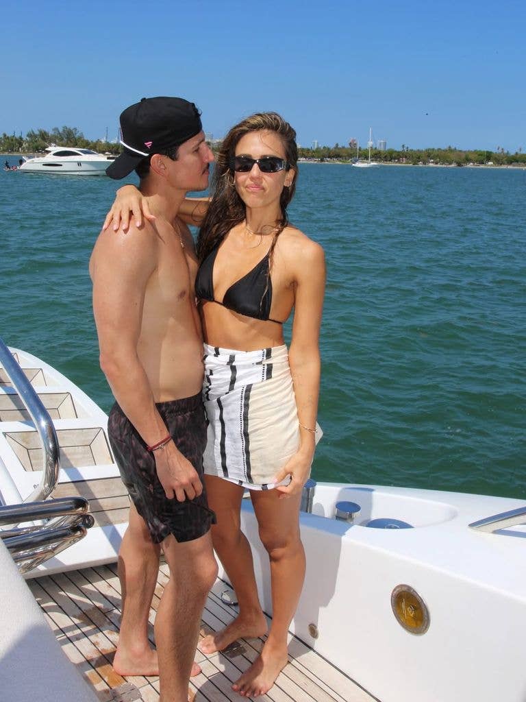 Jessica Alba and Danny Ramirez pose for a photo on a yacht celebrating the former's 45th birthday, shared on Instagram
