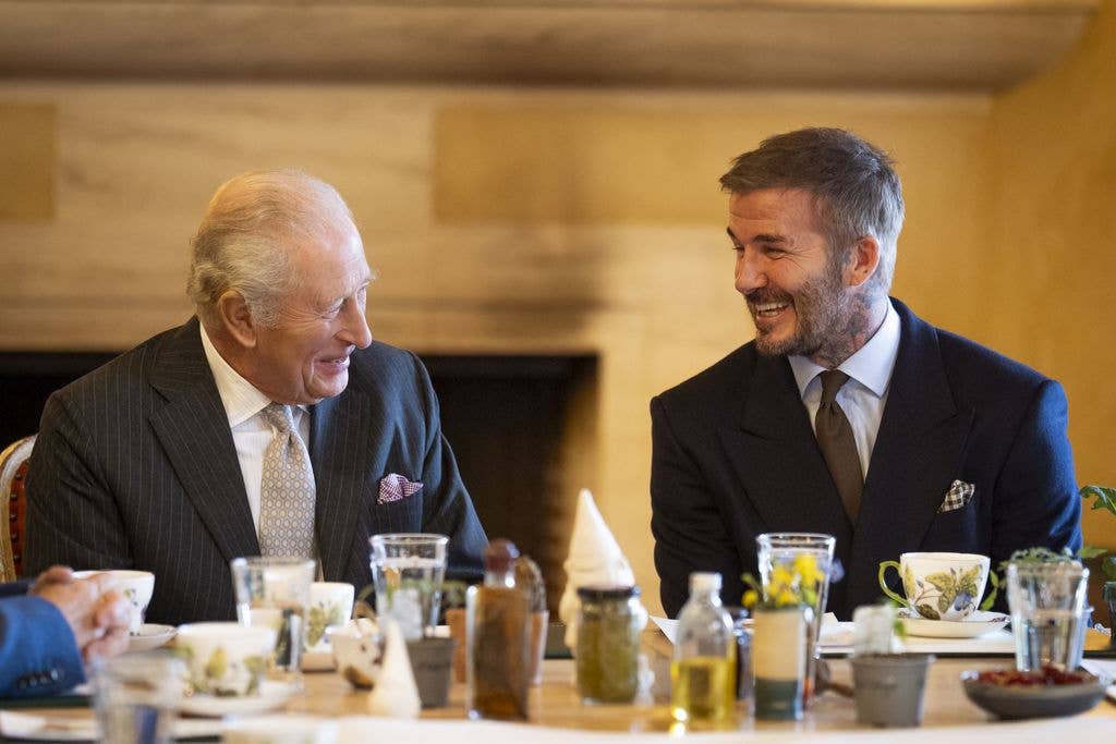 King Charles III and Sir David Beckham during discussions over the designs 