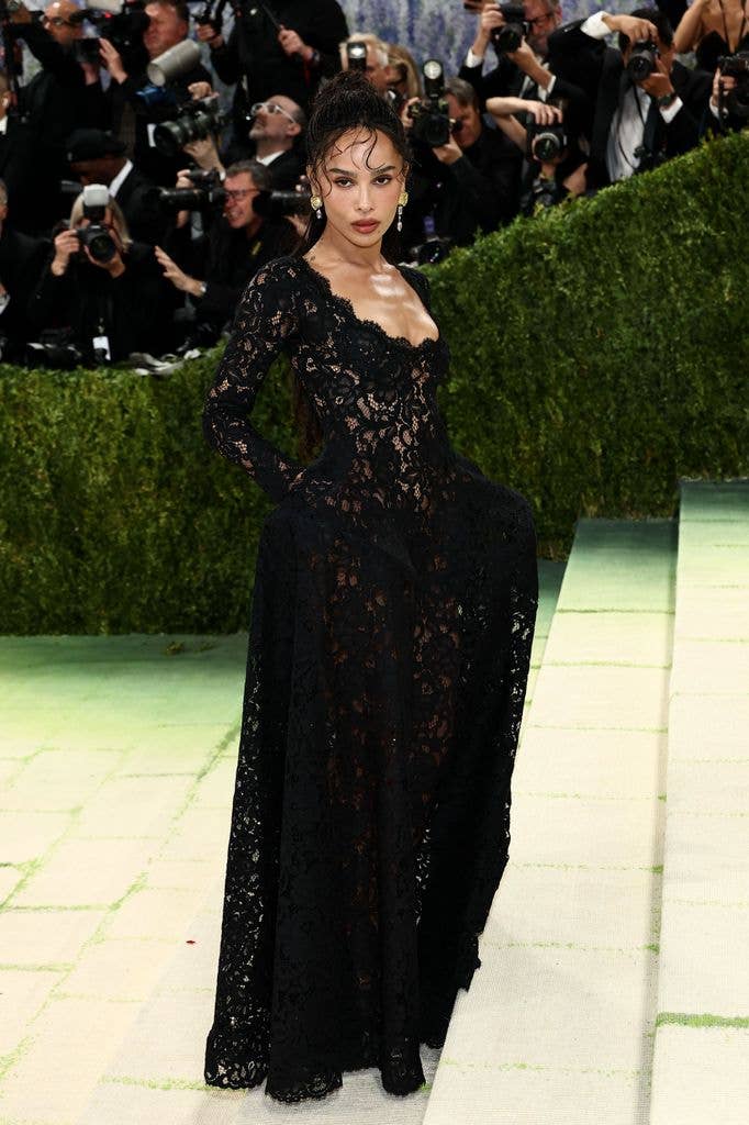Zoe Kravitz wore a black lace dress with long sleeves 