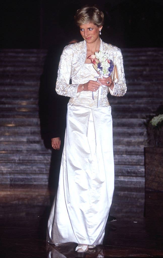 The Princess was a vision in a white gown and matching bolero jacket for her night out at the Winter Garden for a gala dinner. 
