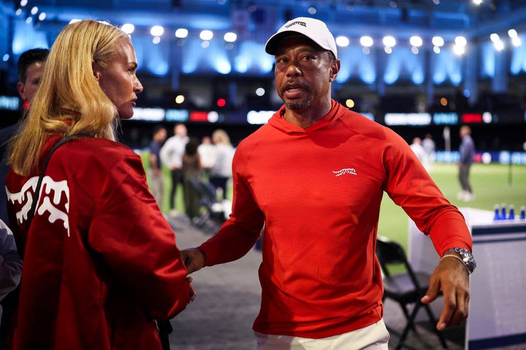 Vanessa and Tiger catch up during a recent tournament in Florida