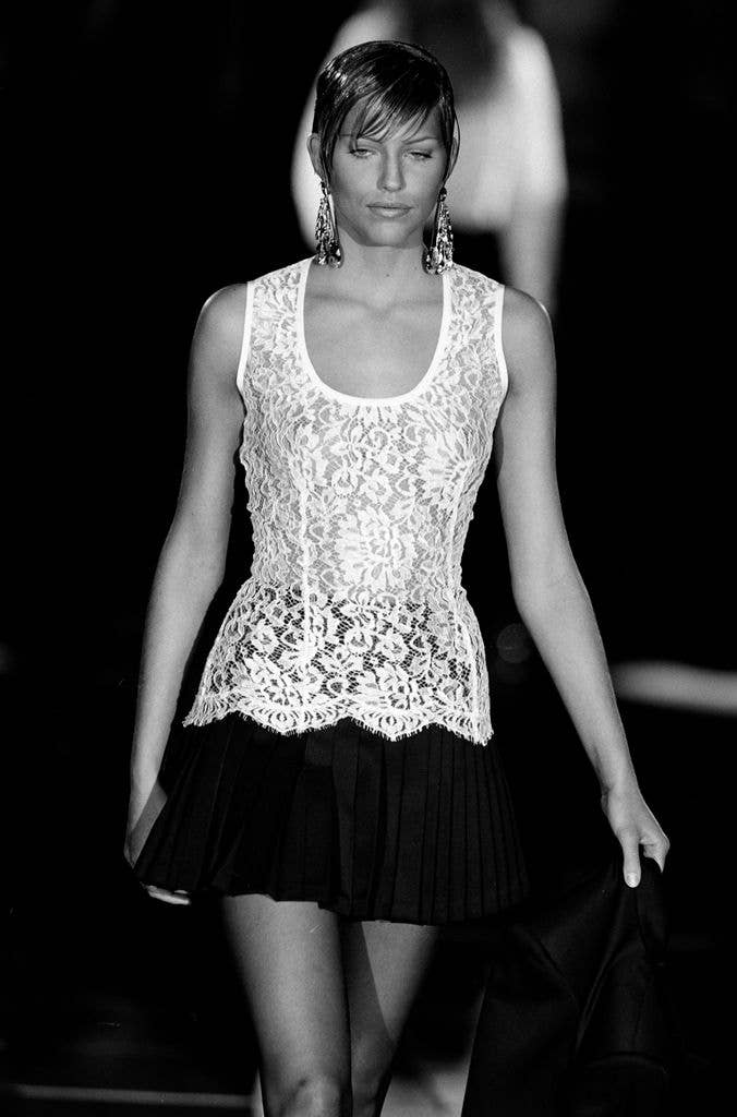 Model Tricia Helfer walks for Versace in 1994