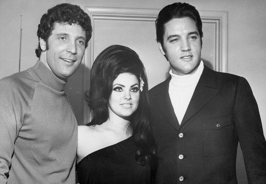 Tom Jones (L) poses with Priscilla and Elvis Presley backstage at the Flamingo Hotel in Las Vegas in 1968