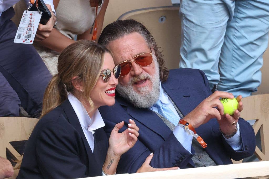 Russell Crowe and Britney Theriot attend Day One of the 2026 French Open 