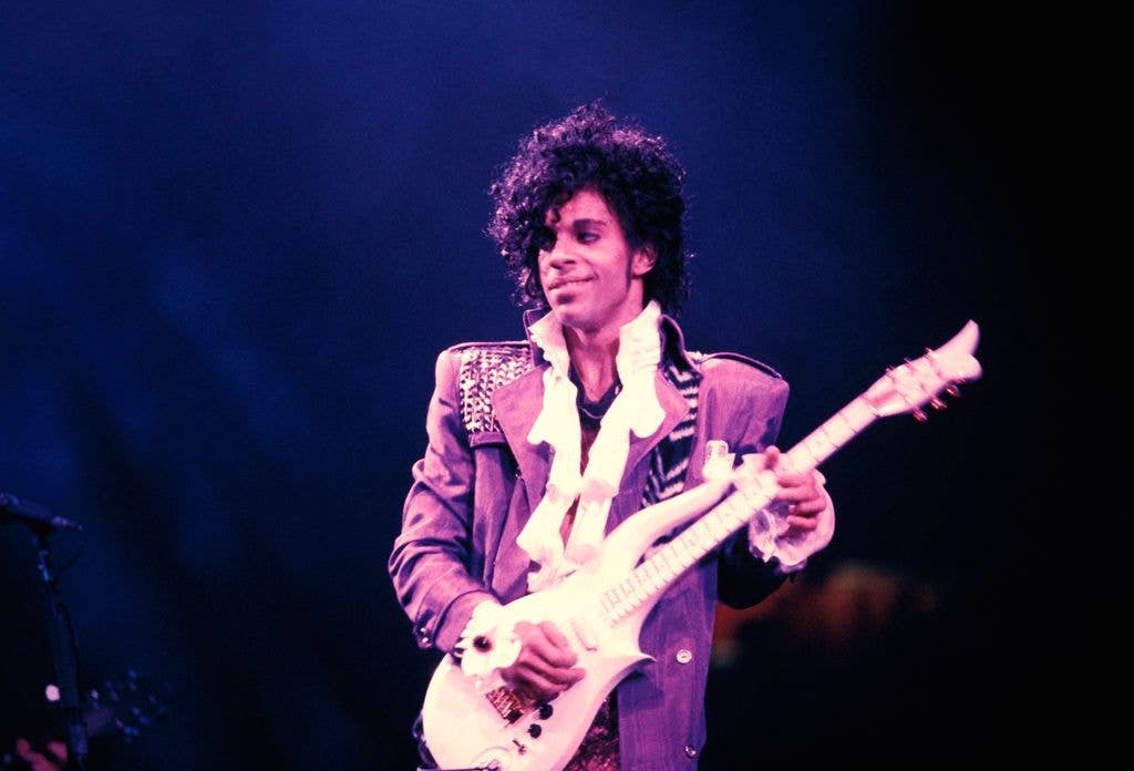 RITZ CLUB  Photo of PRINCE, Prince performing on stage - Purple Rain Tour