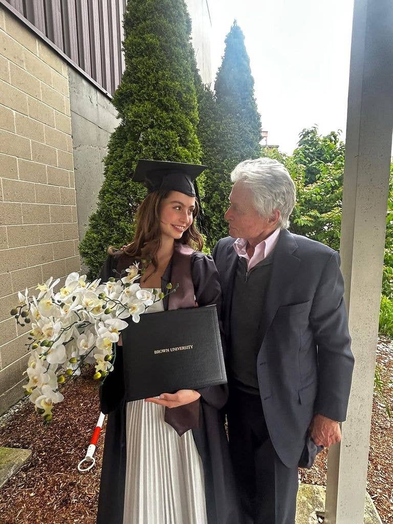 Michael Douglas and Carys Douglas pose for a photo during Carys' graduation from Brown University, shared on Instagram