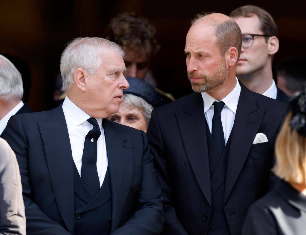 prince william and andrew mountbatten windsor looking serious