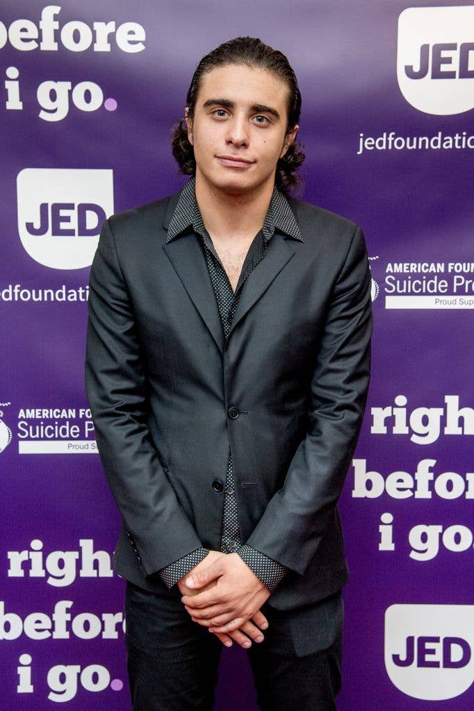 Jake Cannavale wears a black suit to the 'Right Before i Go' benefit performance in 2017.