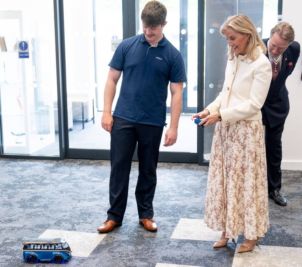 Sophie tries out a remote control car 